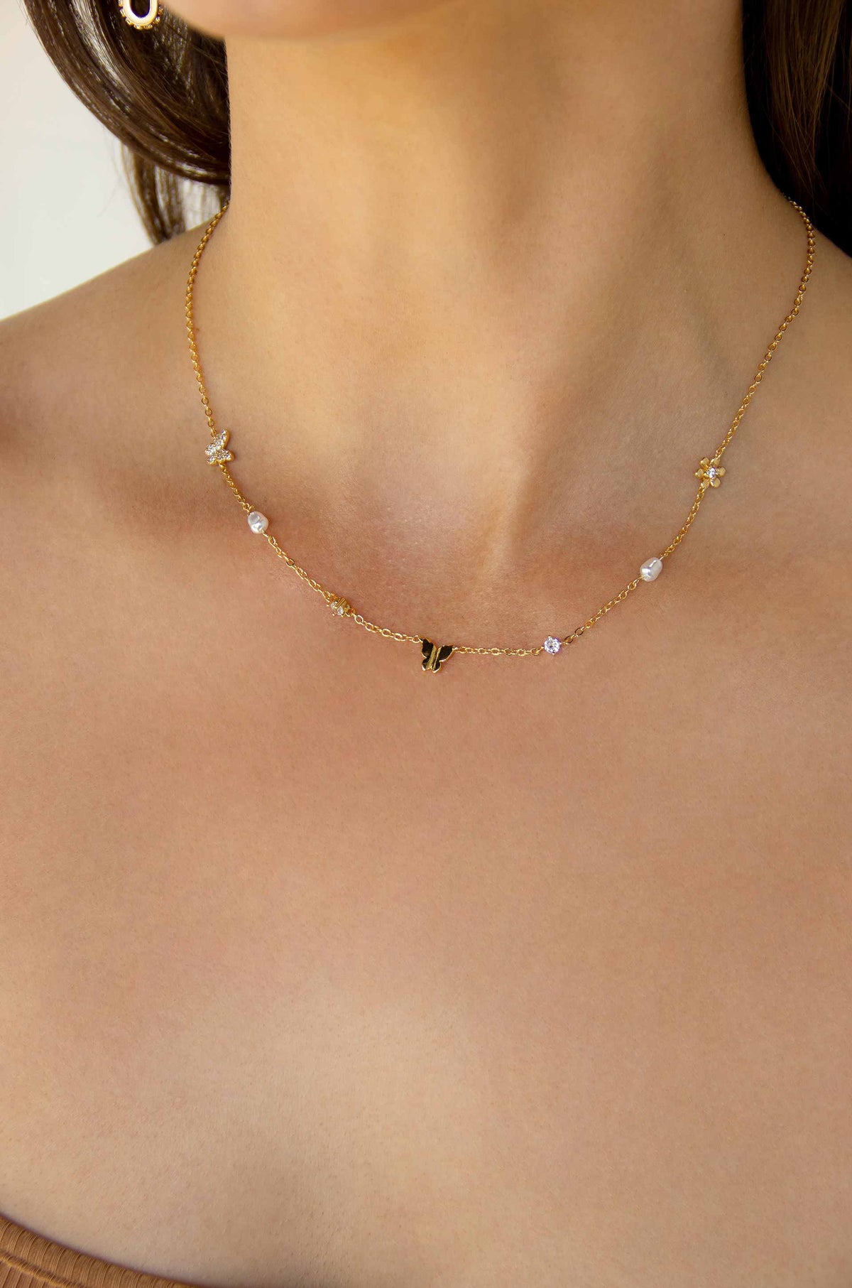 Subtle Butterflies and Pearl Necklace
